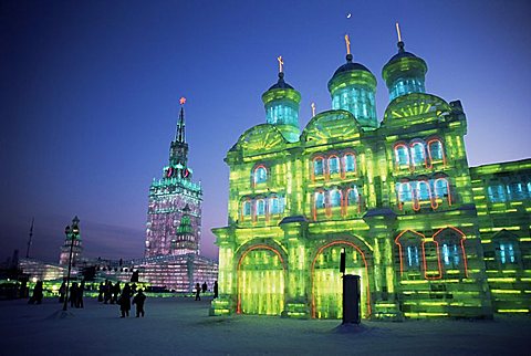 Ice buildings lit at night, Ice Lantern Festival, Bingdeng Jie, Harbin city, Heilongjiang, China, Asia